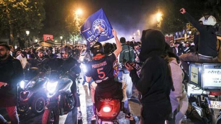 Violence among fans and confrontations with police break out in Paris